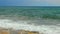 Beautiful calm seascape, blue sea waves splashing, loopable shot for meditation