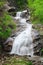 A beautiful , calm waterfall in Northern Norway