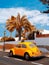 Beautiful Canary location and yellow retro car. Travel aesthetic stylish wallpaper