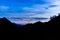 Beautiful captivating landscape of the French Alps mountain range during sunset with power towers