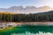 Beautiful Carezza Lake Lago di Carezza in background Latemar Mountains in Dolomites