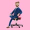 Beautiful cartoon character sitting on an office chair. Bearded businessman in a suit on a pink background.