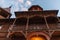 Beautiful carved architecture. Old wooden balcony, bottom view