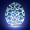 Beautiful carved eggshell on blue background