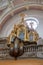 A beautiful carved gilded organ in one of the churches of old Prague