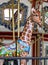 Beautiful carved giraffe on a vintage carousal