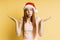 Beautiful caucasian female model wearing santa hat