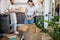 Beautiful caucasian married couple unpacking boxes at home