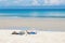 Beautiful Caucasian Woman Sunbathing On The Beach.Young Woman Resting On Sand At Tropical Beach