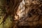 Beautiful cave short with professional lightning. Skazka cave near river Agidel in Bashkortostan