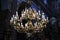 Beautiful chandelier with candles in church
