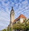 The beautiful Charlottenburg town hall building in Berlin, Germany, against a dramatic sky