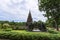 A beautiful chedi is located in the middle of the water at Huay Kaew Temple in Lop Buri Province