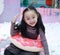 Beautiful cheerful little girl playing pleasure ground on playground