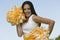 Beautiful Cheerleader Holding Pom-Poms