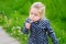 Beautiful child with dandelion flower