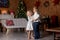 Beautiful children, blond kids, siblings, playing in decorated home for Christmas, enjoying holidays