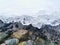 Beautiful chilling view of snow-covered rocks during Winter in Kvaloya island in Tromso, Norway