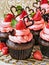 Beautiful Chocolate Cup cakes with Berry Frosting.