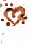 beautiful chocolate heart with splashes in coffee painting technique