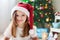 Beautiful Christmas close portrait of little preschool girl at h