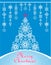 Beautiful Christmas craft blue greeting card with hanging decoration and Xmas tree with handmade paper cutting snowflakes