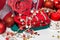 Beautiful Christmas decorations, red candle, knitted socks, balls, wooden carved toys and bells