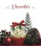 Beautiful Christmas holiday theme cupcake with seasonal flowers and decorations for the month of December