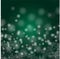 Beautiful Christmas image . White snow flakes on a green background.