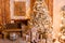 Beautiful Christmas interior. studio for photo shoot. a large Christmas tree in gold style