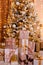 Beautiful Christmas interior. studio for photo shoot. a large Christmas tree in gold style