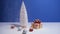 Beautiful Christmas or New Year video banner with copy space. Toy Christmas tree, gift box with red bow and Christmas
