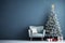 Beautiful Christmas tree with gifts near chair and dusty blue textured wall. Monochrome empty living room Wall scene mockup.