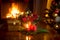 Beautiful Christmas wreath with candles in living room with burn