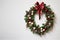 Beautiful Christmas wreath of fresh spruce on a white background. Christmas mood