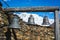 Beautiful church bells in rural village against snow peaks