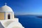 Beautiful church on the caldera and ships in the bay, Fira, Santorini - Thira, Greece