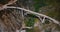 Beautiful cinematic aerial shot of famous Bixby Canyon Bridge at Highway 1, iconic landmark scenery Big Sur California.