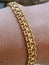 Beautiful circular 24 carat gold bracelet