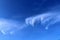 Beautiful cirrus clouds in natural cloud formations in a deep blue sky