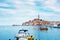 Beautiful city landscape with sea boats, colorful houses and an ancient tower in Rovinj, Croatia, Europe. vacation, rest -