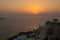 The beautiful city of Oia in Santorini/Greece during golden sunset. T