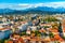 Beautiful cityscape of Ljubljana with picturesque mountains on the horizon, Slovenia