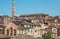 Beautiful cityscape with towers and old homes of Siena, Tuscany. Tile roofs of Italy. UNESCO World Heritage Site