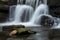 Beautiful claming landscape image of Scaleber Force waterfall in Yorkshire Dales in England during Winter morning