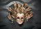 Beautiful classical mask from Venice on black wall. Carnival mask