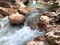 Beautiful clean mountain river flows over the rocks