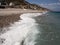 Beautiful clear water of Mediterranean sea, Pebble coast of Sicily, summer holiday. Selective focus