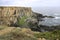 Beautiful cliffs of Sardao Cape with white storks