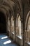 Beautiful cloister at Evora Cathedral. Stone arches, gothic style. Portugal,